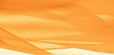 Sarı ipek kumaş. Tasarımlarınız, aksanlarınız, duvar kağıtlarınız, posterleriniz ve kartpostallarınız için mükemmel. doku arkaplan deseni.