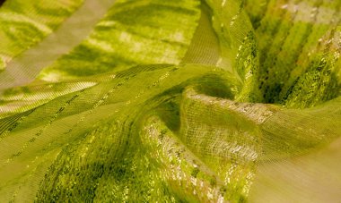 ipek kumaş, yeşil-kahverengi, soyut arka plan kumaşı veya sıvı dalga veya grunge ipek kumaş kıvrımlı kadife kumaş veya lüks Noel arkaplanı veya zarif duvar kağıdı tasarımı