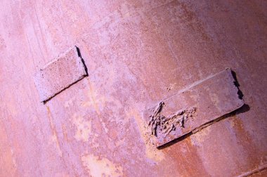 : Paslı demir dokusu. Eski paslı demir dokusu iyi bir grunge gibi. Arka plan için eski paslı metal plaka. Paslı metal yüzey, arka plan olarak kullanılabilir.