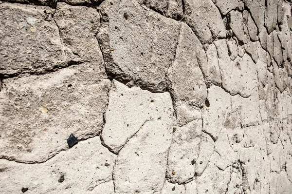 Texture of old plaster. On the wall of old plaster