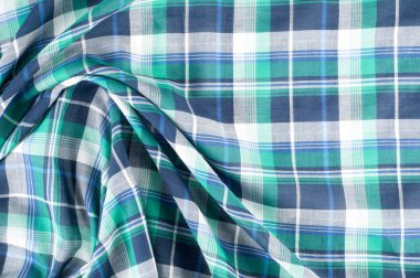 Kumaş dokusu. doku, tekstil, kumaş, dokuma malzeme. Fotoğraf stüdyosunda vurdu. genellikle dokuma veya örme Tekstil lifleri tarafından üretilen kumaş,.