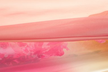 Pembe kumaş çiçek işlemeli. doku. Stüdyo fotoğrafı