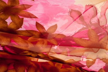 Pembe kumaş çiçek işlemeli. doku. Stüdyo fotoğrafı