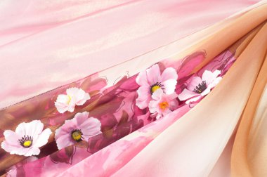 Pembe kumaş çiçek işlemeli. doku. Stüdyo fotoğrafı