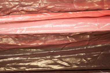 Pembe kahverengi şeffaf kumaş. doku. bornoz.