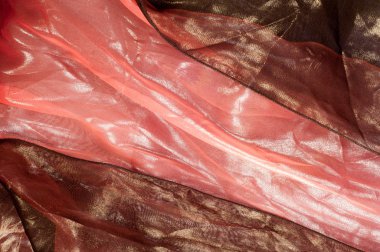 Pembe kahverengi şeffaf kumaş. doku. bornoz. Stüdyo fotoğrafı