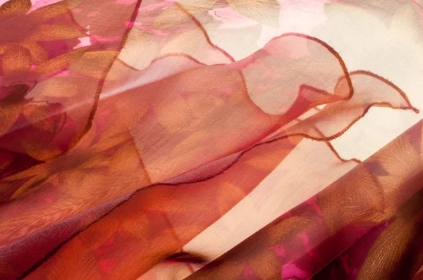 Pembe kumaş çiçek işlemeli. doku