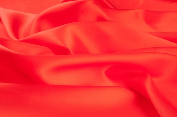 red cloth. tissue, textile, cloth, fabric, material, texture. cloth, typically produced by weaving or knitting textile fibers.