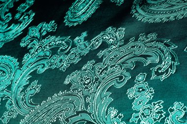 Kumaş renkleri yeşil, desenli. Fotoğraf stüdyosu