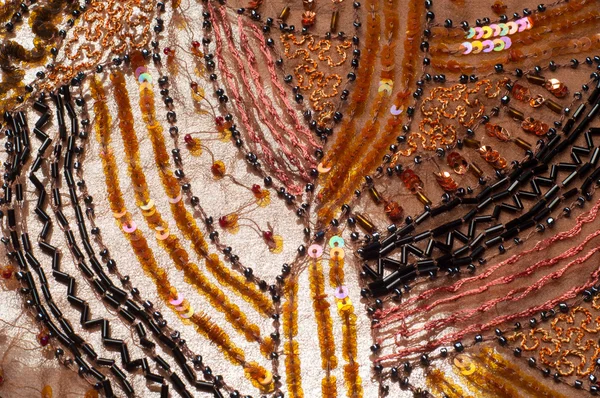 Tela marrón cuentas incrustadas, lentejuelas, perlas — Foto de Stock