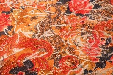 Kırmızı kumaş dokulu ve çiçek gül. Fotoğraf stüdyosu