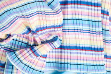 Pileli kumaş. Sinii sarı kırmızı beyaz çizgili doku