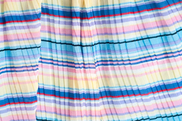 Pleated fabric. Sinii yellow red white stripes texture — Stock Photo, Image