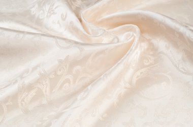Kumaş ipek doku, krema, krem rengi, krem renkli, soluk bej. iyi, güçlü, yumuşak, parlak elyaf Koza yapımında silkworms tarafından üretilen ve iplik ve kumaş yapmak için toplanan.