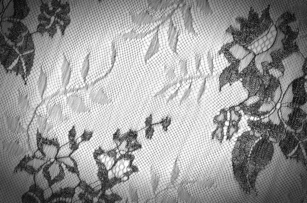 Текстурные кружева ткани. кружева на белом фоне студии — стоковое фото