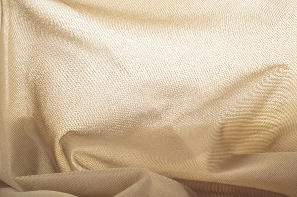 シルクの手触りの生地、クリーミーな淡いベージュ — ストック写真