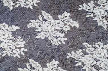 Doku dantel kumaş. dantel beyaz arka plan stüdyo üzerinde