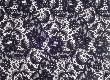 Doku dantel kumaş. dantel beyaz arka plan stüdyo üzerinde. ince kumaş iplik veya iş parçacığı yapılmış. genellikle bir pamuk veya ipek, döngü, büküm veya desenleri iplik örgü tarafından yapılmıştır