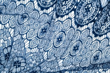 Doku dantel kumaş. dantel beyaz arka plan stüdyo üzerinde. ince kumaş iplik veya iş parçacığı yapılmış. genellikle bir pamuk veya ipek, döngü, büküm veya desenleri iplik örgü tarafından yapılmıştır