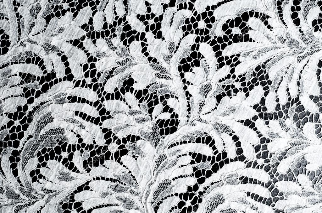 Lace fabric texture. lace on black background studio