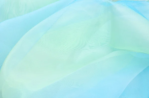 Die Textur des Seidenstoffes, blaues hellgrünes Muster — Stockfoto