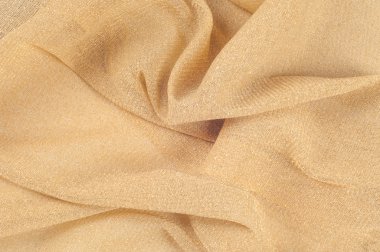 Bej rengi ipek kumaşın dokusu. Badem
