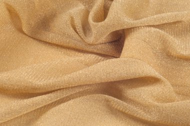 Bej rengi ipek kumaşın dokusu