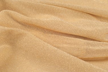 Bej rengi ipek kumaşın dokusu. Badem