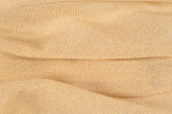Strukturen på sidentyg i beige färg — Stockfoto