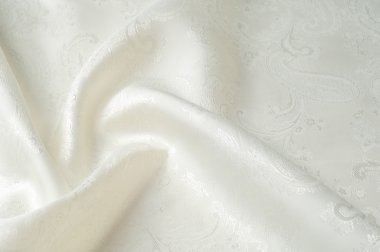 İpek kumaş doku, renk nane krem, çiçek çizimleri ile. olaydan sonra ve onu düğün günü veya hemen önce bir Bayan.