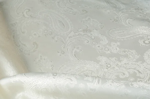 Textura de tecido de seda, cor creme de hortelã, com desenhos de flores — Fotografia de Stock