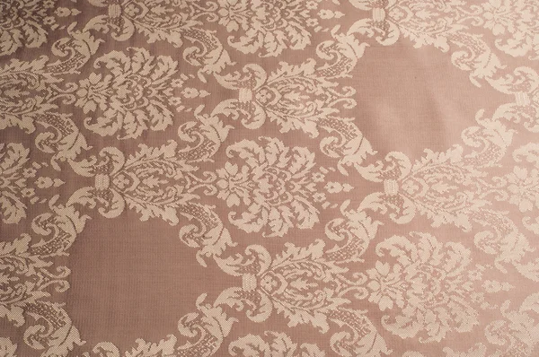 La textura de la tela de seda de color beige con pequeño patrón blanco —  Fotos de Stock