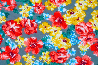 doku ipek kumaştan. Üzerine kumaş boyalı sarı kırmızı çiçekler