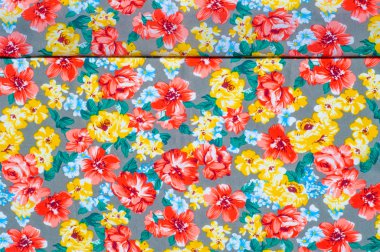 doku ipek kumaştan. Üzerine kumaş boyalı sarı kırmızı çiçekler