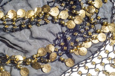 İpek kumaş dokusu, mavi, altın sikke. Oryantal tarzda