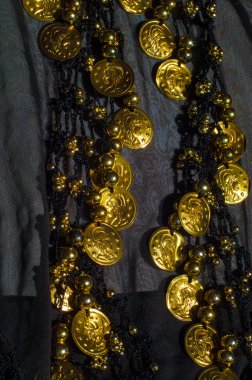 İpek kumaş dokusu, mavi, altın sikke. Oryantal tarzda