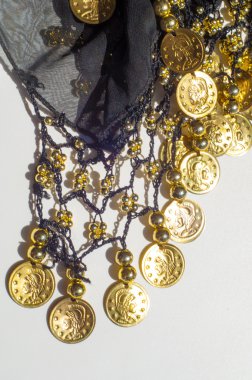 İpek kumaş dokusu, mavi, altın sikke. Oryantal tarzda