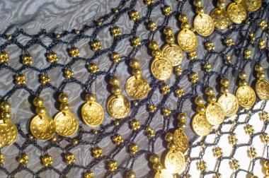 İpek kumaş dokusu, mavi, altın sikke. Oryantal tarzda