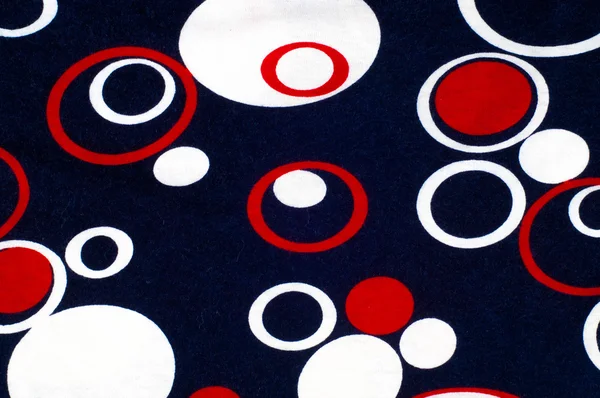 A textura do tecido de malha com círculos azuis pintados A re — Fotografia de Stock