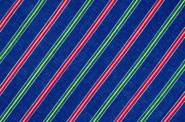 Батистська текстура тканини. смугаста розмальовка, червоно-зелений синій білий s — стокове фото