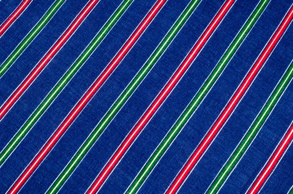 Batiste fabric texture. striped coloring, red green blue white s — Stock Photo, Image