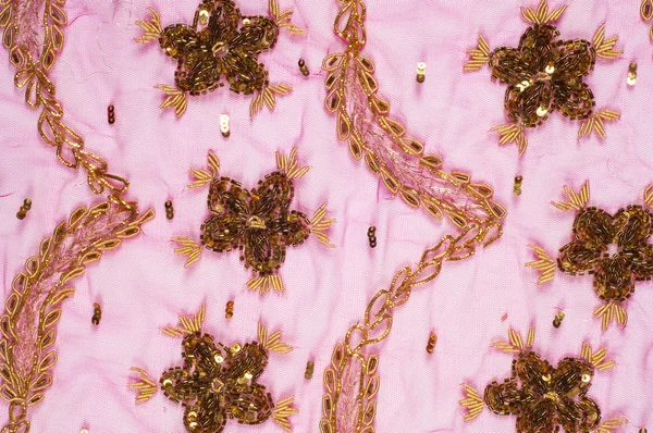 Laço rosa bordado com contas e lantejoulas — Fotografia de Stock