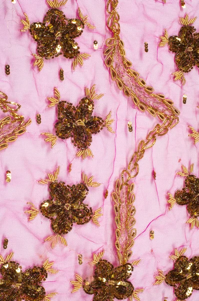 Розовое кружево с вышивками и блёстками — стоковое фото