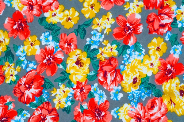 Texture silk cloth. Yellow red flowers painted on cloth — Stock Photo, Image