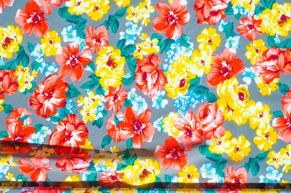 Texture silk cloth. Yellow red flowers painted on cloth — Stock Photo, Image