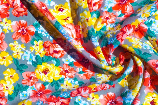 Texture silk cloth. Yellow red flowers painted on cloth — Stock Photo, Image