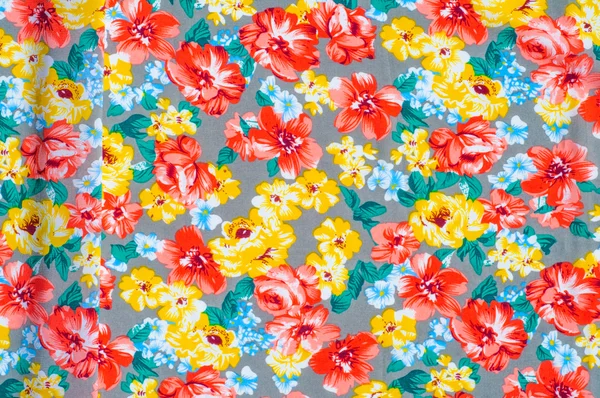 Texture silk cloth. Yellow red flowers painted on cloth — Stock Photo, Image