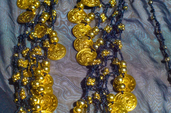 Silk fabric texture, blue, gold coins. Oriental style — Stock Photo, Image