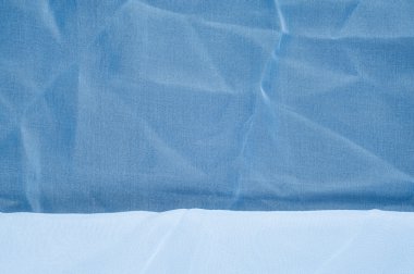 kumaş ipek doku mavi renkleri. pembe ve mavi saten kumaş arka planı için