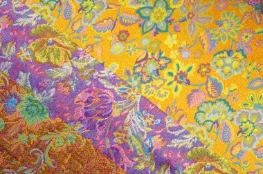 Brokar kumaş dokusu. çiçek desenle boyalı